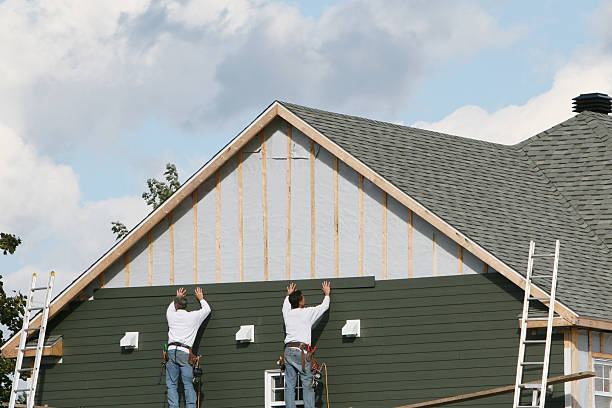 Professional Siding Contractor technician working in Dublin, IN
